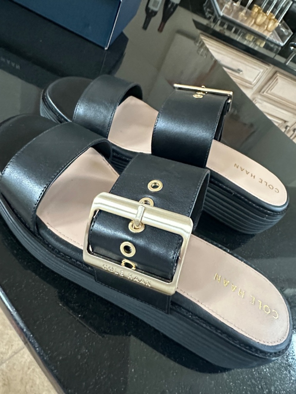 Cole Haan Black Slide Sandals with Gold Buckle